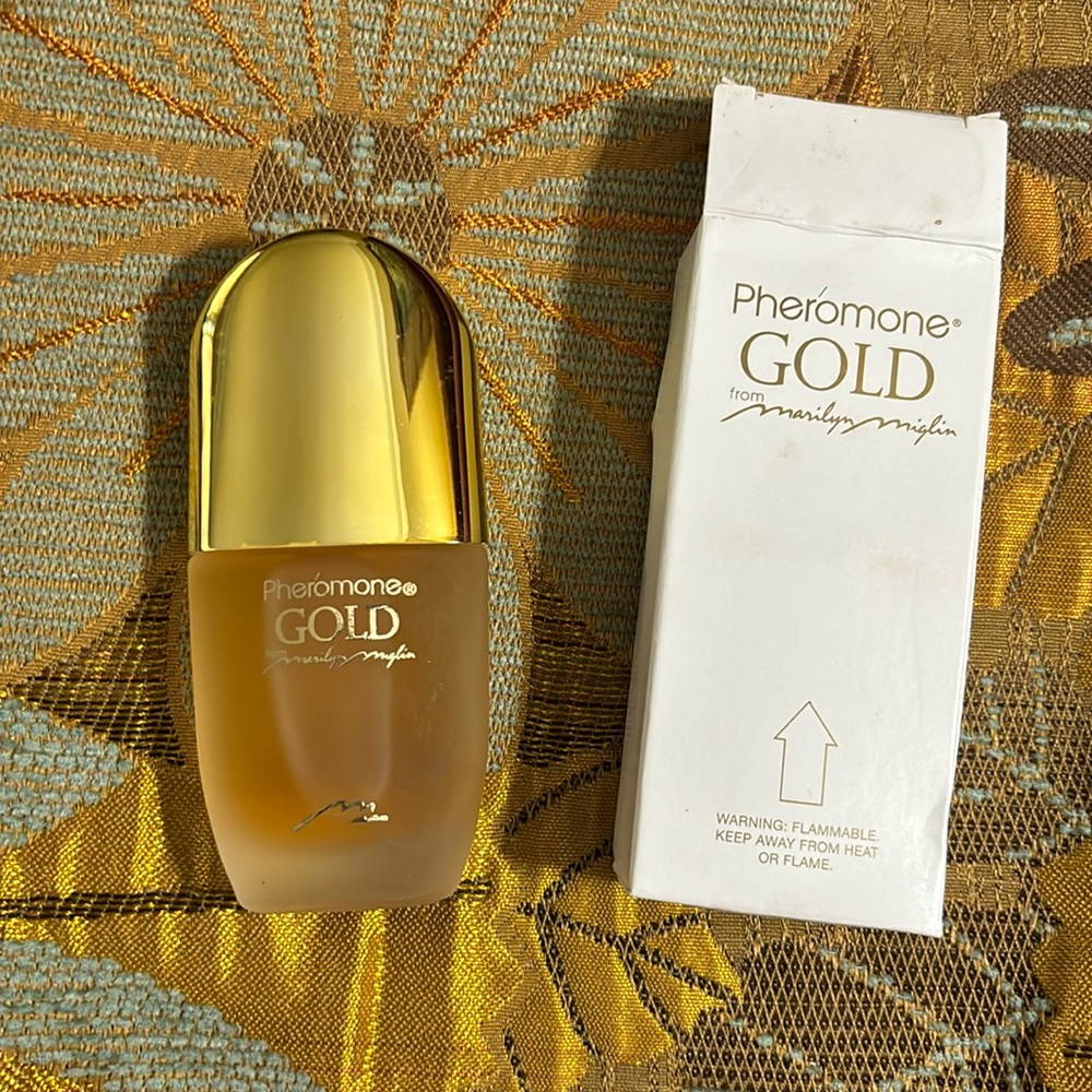 Pheromone Gold from Marilyn Miglin 1 oz perfume spray. New in box.